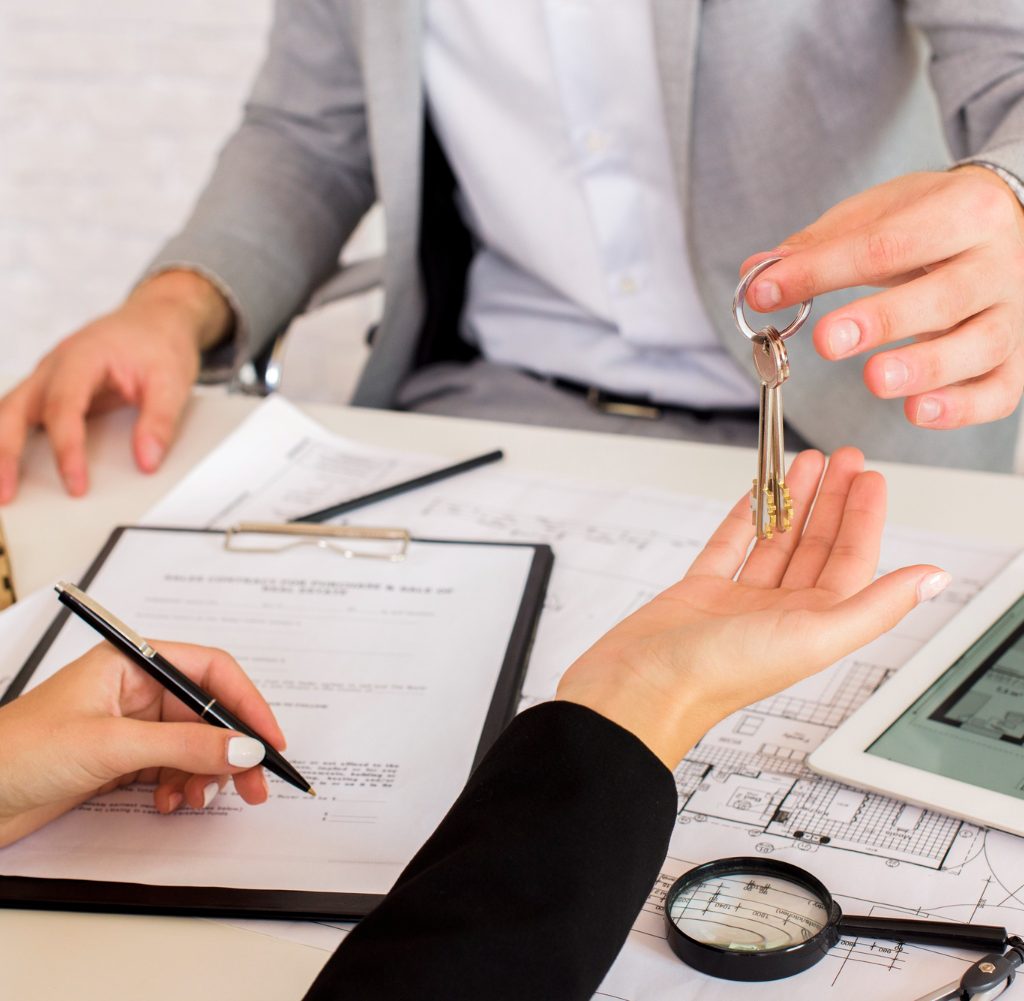 Two people finalizing an estate plan agreement.